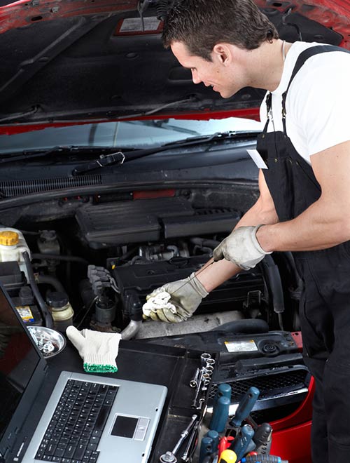 Mechanic Checking Car Oil — Automotive & Towing Service in Huskisson, NSW
